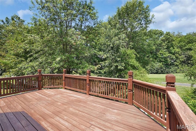 1473 Crooked Stick Dr, Ofallon, MO 63366 - wooden deck featuring view of wooded area