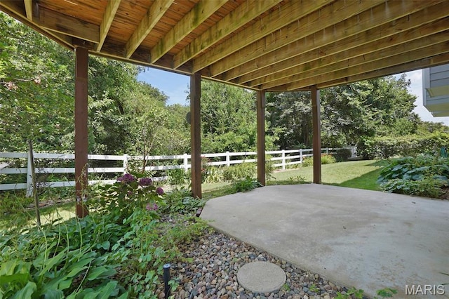 1473 Crooked Stick Dr, Ofallon, MO 63366 - fenced backyard featuring a patio and view of wooded area