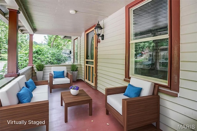 86 Mill St, Elsah, IL 62028 - covered porch with an outdoor living space