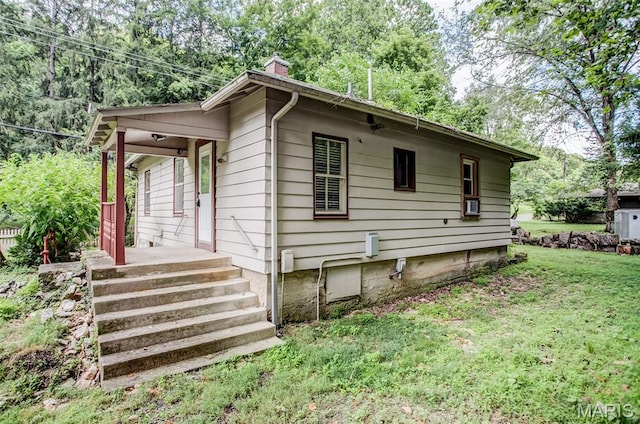 86 Mill St, Elsah, IL 62028 - view of front of home featuring a chimney and a front yard