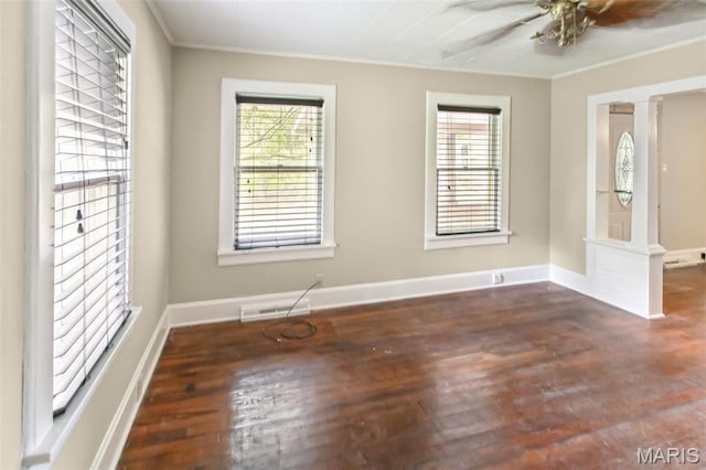 86 Mill St, Elsah, IL 62028 - unfurnished room with ornamental molding, wood finished floors, plenty of natural light, and ceiling fan