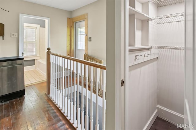 86 Mill St, Elsah, IL 62028 - hall featuring dark wood-style flooring and an upstairs landing