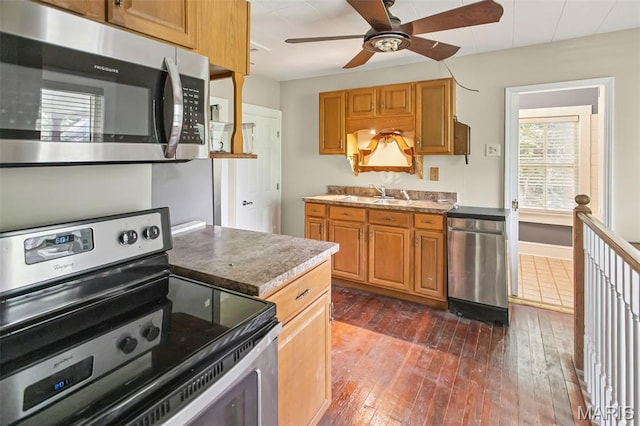 86 Mill St, Elsah, IL 62028 - kitchen with appliances with stainless steel finishes, ceiling fan, and dark wood-style floors