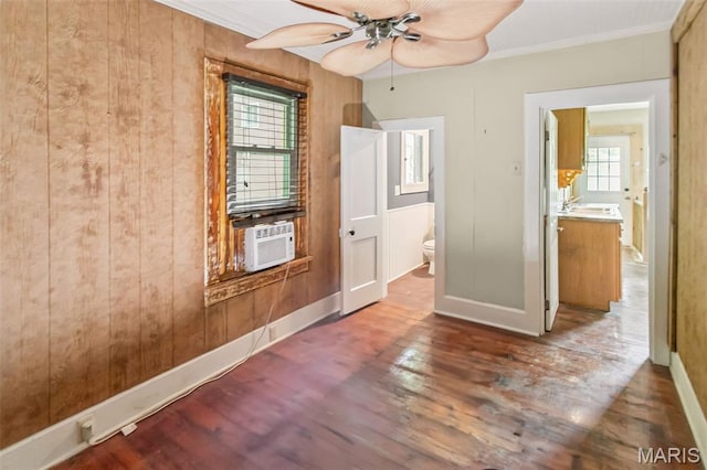 86 Mill St, Elsah, IL 62028 - unfurnished bedroom featuring wood finished floors, cooling unit, ensuite bathroom, ornamental molding, and wooden walls