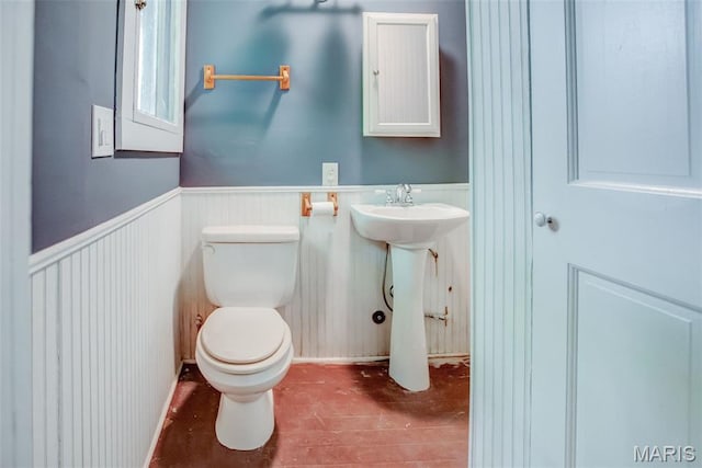 86 Mill St, Elsah, IL 62028 - bathroom with wood finished floors and a wainscoted wall