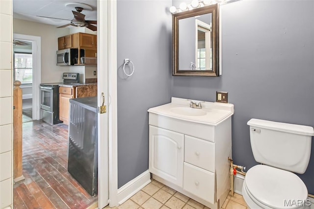 86 Mill St, Elsah, IL 62028 - bathroom featuring a ceiling fan and vanity
