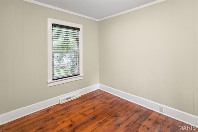 86 Mill St, Elsah, IL 62028 - empty room with dark wood-style flooring and crown molding
