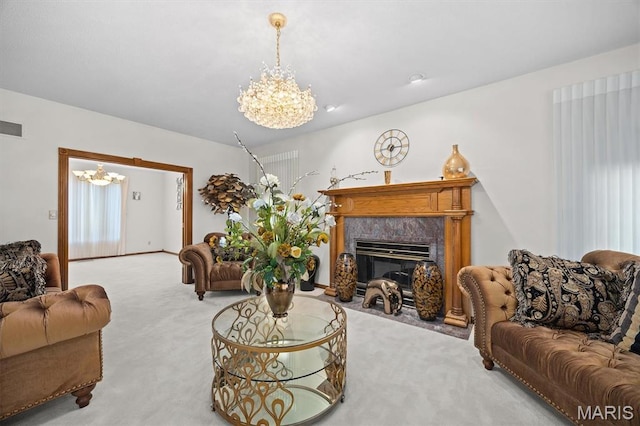 517 E Waters Edge Dr, Shiloh, IL 62221 - living room featuring a chandelier, carpet floors, and a fireplace