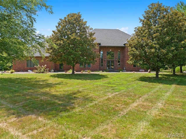517 E Waters Edge Dr, Shiloh, IL 62221 - view of front of house with a front yard and brick siding