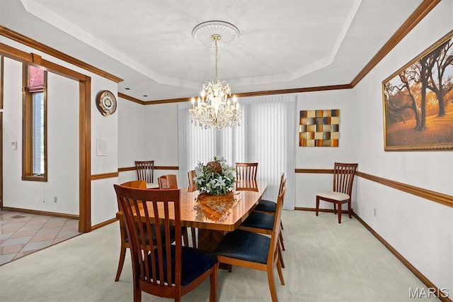 517 E Waters Edge Dr, Shiloh, IL 62221 - dining room featuring a raised ceiling, light colored carpet, a chandelier, and ornamental molding