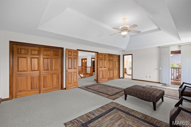 517 E Waters Edge Dr, Shiloh, IL 62221 - carpeted bedroom featuring a raised ceiling, access to exterior, and ceiling fan