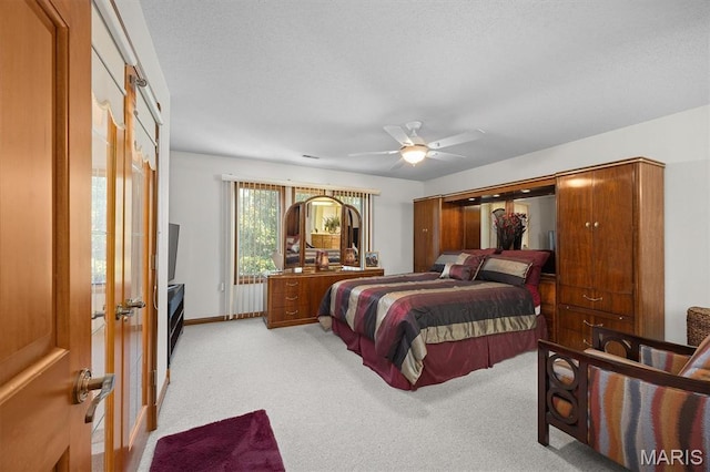 517 E Waters Edge Dr, Shiloh, IL 62221 - bedroom with light carpet, french doors, and a ceiling fan
