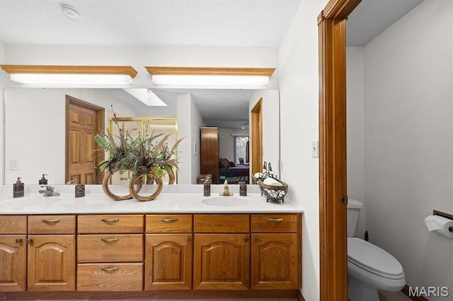 517 E Waters Edge Dr, Shiloh, IL 62221 - ensuite bathroom with double vanity and an enclosed shower