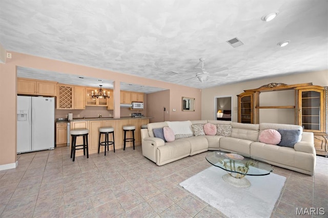 517 E Waters Edge Dr, Shiloh, IL 62221 - living area featuring a chandelier, a ceiling fan, and recessed lighting
