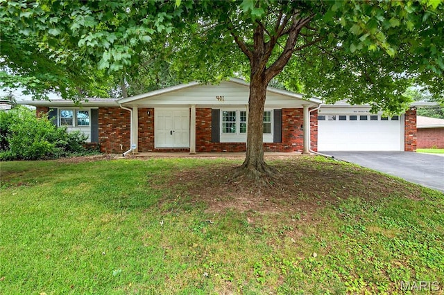 401 Willowbrook Ln, Collinsville, IL 62234 - single story home featuring driveway, an attached garage, a front lawn, and brick siding