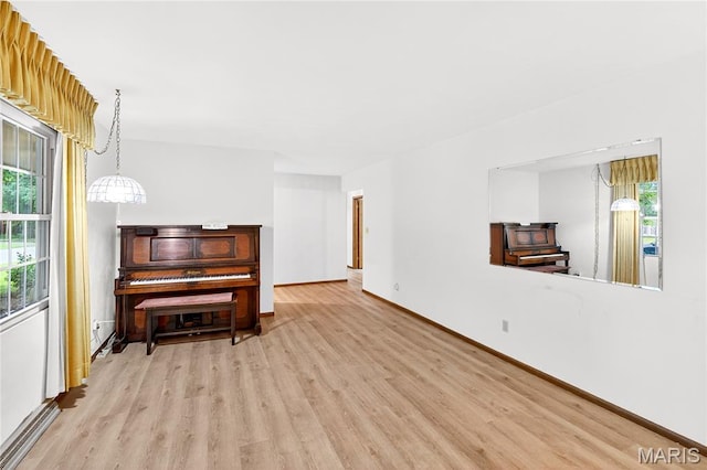 401 Willowbrook Ln, Collinsville, IL 62234 - living area featuring wood finished floors and plenty of natural light