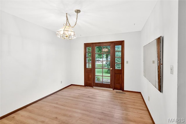 401 Willowbrook Ln, Collinsville, IL 62234 - foyer with a chandelier and light wood finished floors
