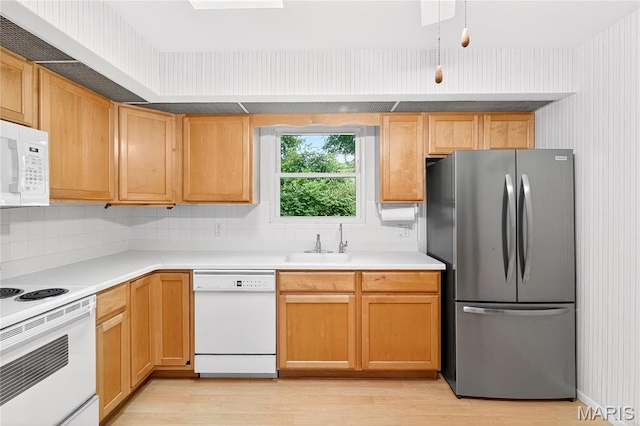 401 Willowbrook Ln, Collinsville, IL 62234 - kitchen featuring white appliances, light wood-style floors, decorative backsplash, and light countertops