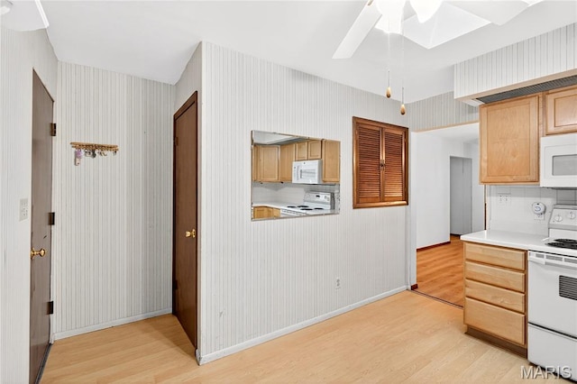 401 Willowbrook Ln, Collinsville, IL 62234 - kitchen with white appliances, light wood-style floors, a ceiling fan, light countertops, and wallpapered walls