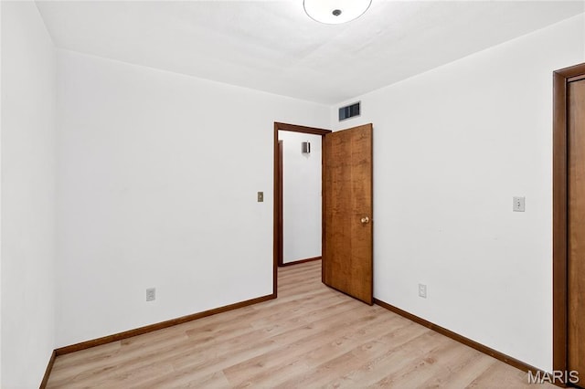 401 Willowbrook Ln, Collinsville, IL 62234 - unfurnished room with light wood finished floors and baseboards