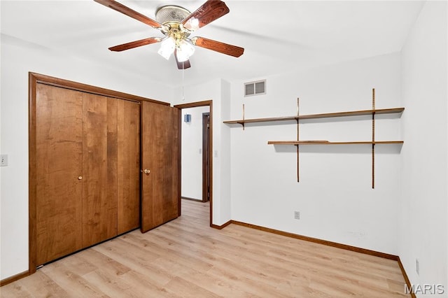 401 Willowbrook Ln, Collinsville, IL 62234 - unfurnished bedroom featuring light wood-style flooring, a closet, and ceiling fan