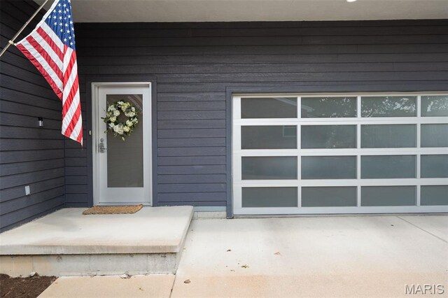 5951 Jamieson Ave, Saint Louis, MO 63109 - doorway to property with a garage