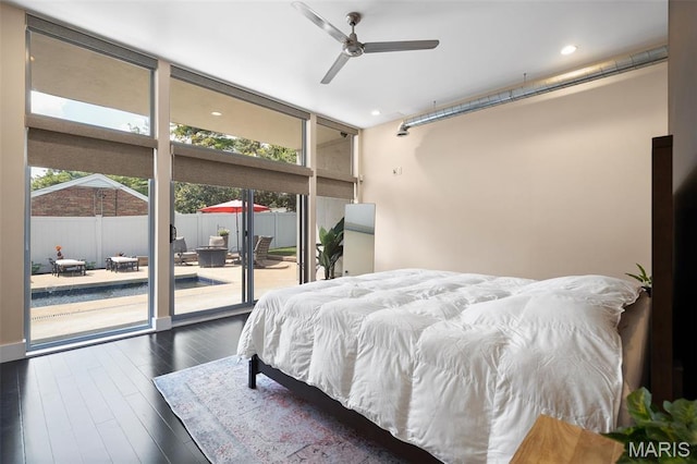 5951 Jamieson Ave, Saint Louis, MO 63109 - bedroom featuring a wall of windows, access to outside, dark wood-style floors, and recessed lighting