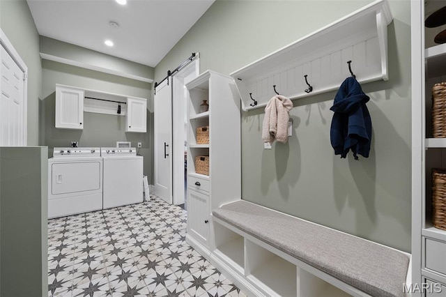 5951 Jamieson Ave, Saint Louis, MO 63109 - mudroom featuring light flooring, independent washer and dryer, recessed lighting, and a barn door
