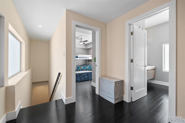 5951 Jamieson Ave, Saint Louis, MO 63109 - hall featuring an upstairs landing, dark wood-style flooring, healthy amount of natural light, and recessed lighting