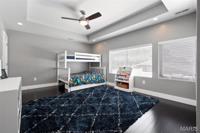 5951 Jamieson Ave, Saint Louis, MO 63109 - bedroom with wood-type flooring, a raised ceiling, recessed lighting, and a ceiling fan