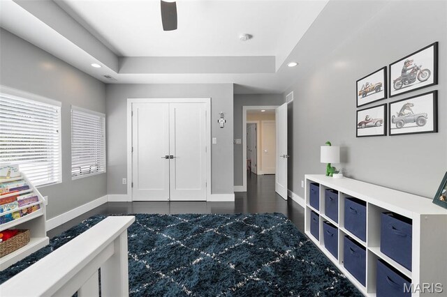 5951 Jamieson Ave, Saint Louis, MO 63109 - bedroom featuring recessed lighting, a raised ceiling, ceiling fan, a closet, and dark wood finished floors