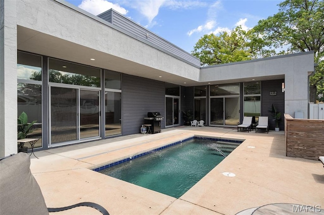 5951 Jamieson Ave, Saint Louis, MO 63109 - swimming pool featuring a patio area and area for grilling