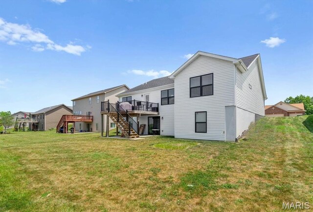 1433 Victoria Square Ct, Ofallon, IL 62269 - rear view of house featuring stairs, a deck, and a lawn