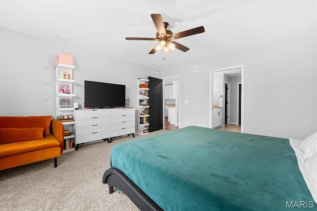 1433 Victoria Square Ct, Ofallon, IL 62269 - bedroom featuring light colored carpet, a ceiling fan, and ensuite bath