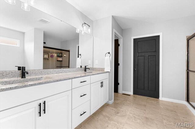 1433 Victoria Square Ct, Ofallon, IL 62269 - bathroom with double vanity and a shower stall