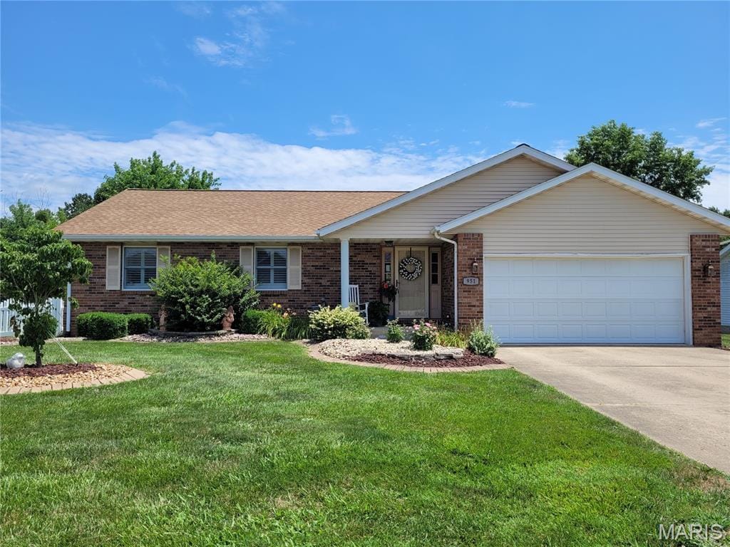951 Albers Ln, Bethalto, IL 62010 - ranch-style house featuring brick siding, an attached garage, a front lawn, and concrete driveway