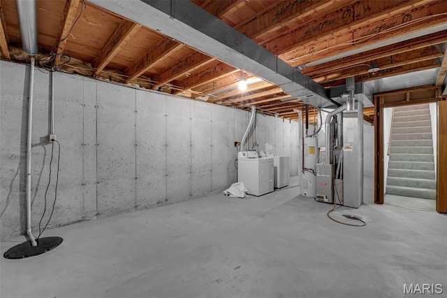 2961 Plum Leaf Cir, Saint Peters, MO 63303 - unfinished below grade area with washing machine and clothes dryer, stairway, heating unit, and electric water heater