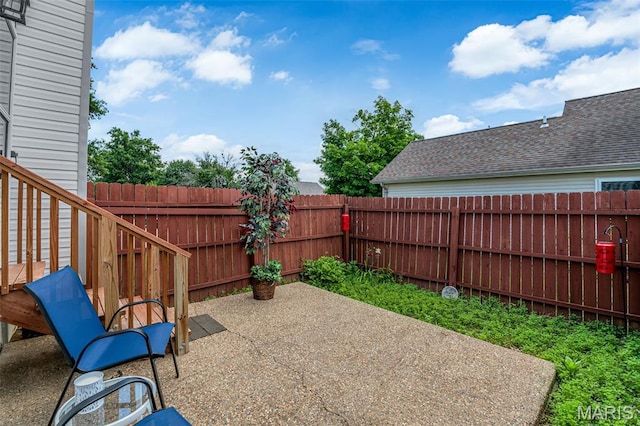 2961 Plum Leaf Cir, Saint Peters, MO 63303 - fenced backyard featuring a patio area