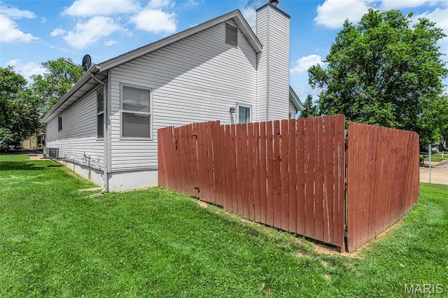 2961 Plum Leaf Cir, Saint Peters, MO 63303 - view of property exterior with a chimney and a cooling unit
