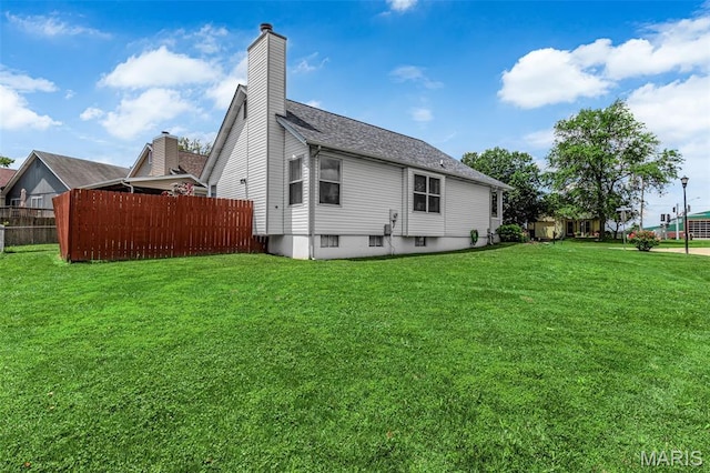 2961 Plum Leaf Cir, Saint Peters, MO 63303 - rear view of property featuring a chimney and a shingled roof