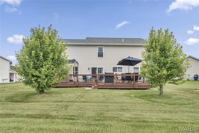22 Dean Wells Ct, Warrenton, MO 63383 - back of house with a deck and a lawn