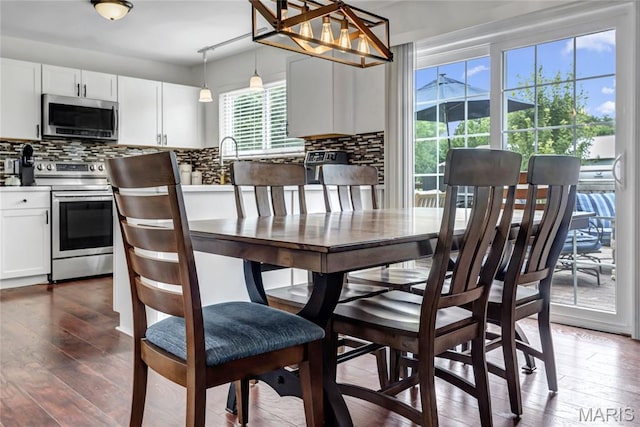 22 Dean Wells Ct, Warrenton, MO 63383 - dining room featuring hardwood / wood-style flooring and a chandelier