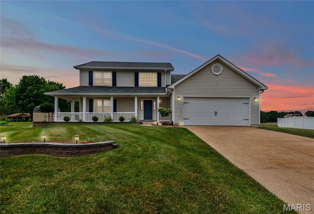 22 Dean Wells Ct, Warrenton, MO 63383 - view of front facade with covered porch, an attached garage, driveway, and a front lawn