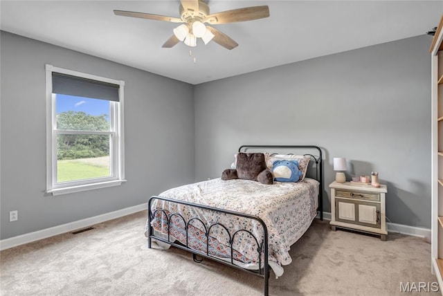 22 Dean Wells Ct, Warrenton, MO 63383 - carpeted bedroom with baseboards and ceiling fan