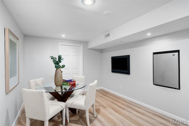 17527 Adams Way Ct, Wildwood, MO 63005 - dining space with wood finished floors and recessed lighting