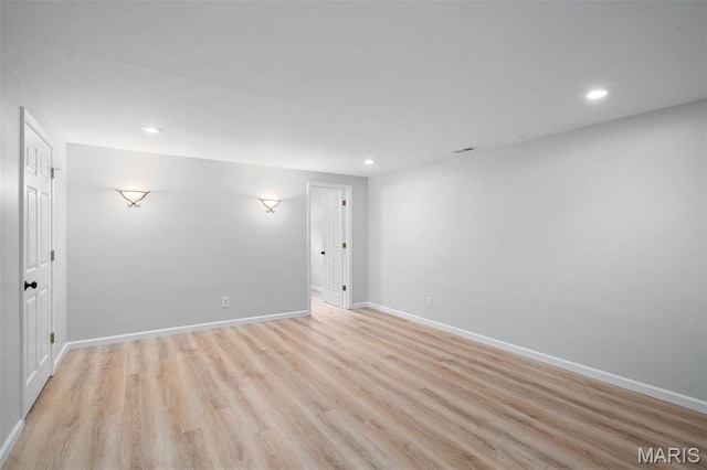 17527 Adams Way Ct, Wildwood, MO 63005 - unfurnished room with light wood-style floors and recessed lighting