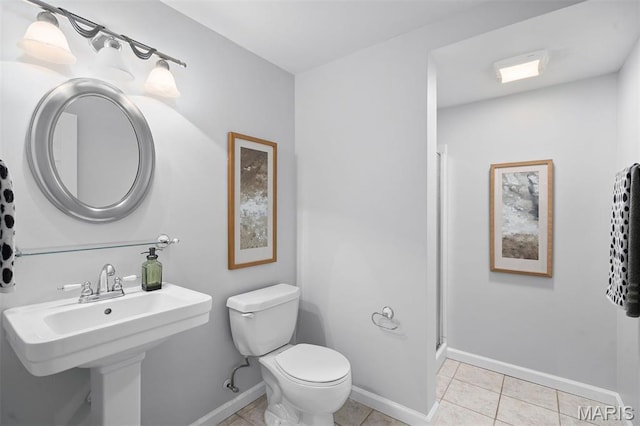 17527 Adams Way Ct, Wildwood, MO 63005 - bathroom with tile patterned floors and a shower stall