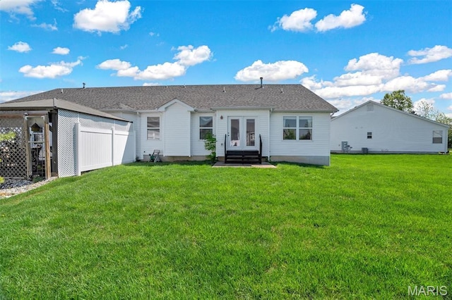 4817 Misty Wood Ct, Wentzville, MO 63385 - rear view of property featuring entry steps, french doors, and a yard