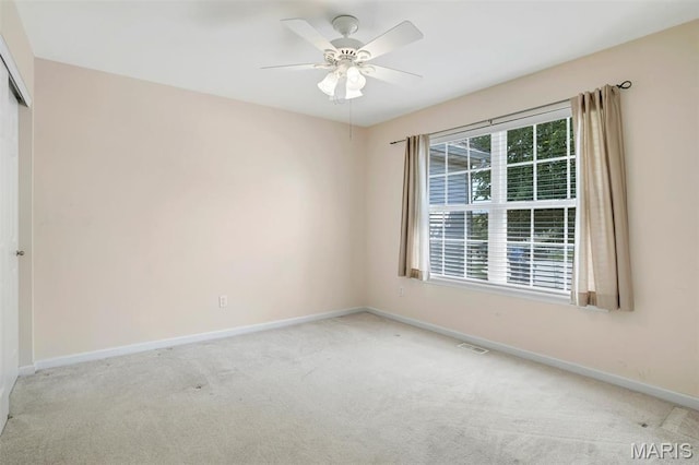 4817 Misty Wood Ct, Wentzville, MO 63385 - carpeted spare room featuring baseboards and a ceiling fan