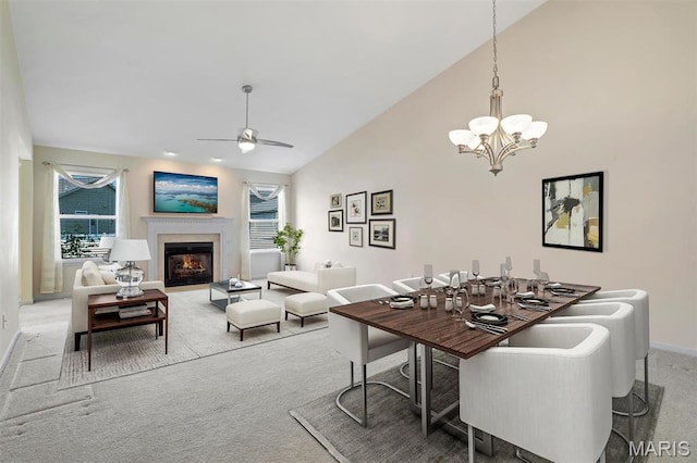 4817 Misty Wood Ct, Wentzville, MO 63385 - dining space featuring light carpet, a ceiling fan, healthy amount of natural light, and high vaulted ceiling